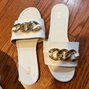 White sandals never worn